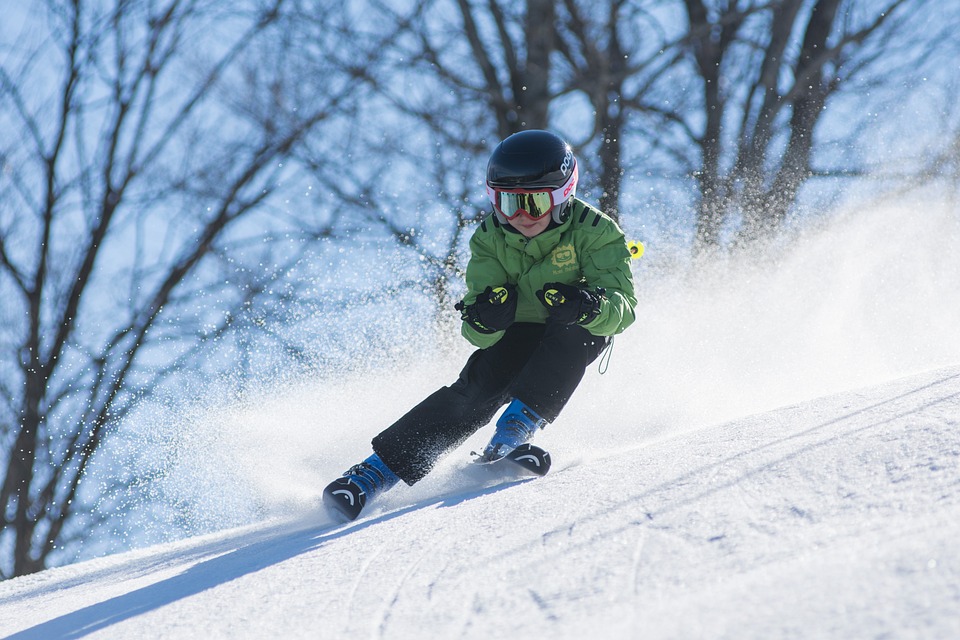 boy skiing in snow